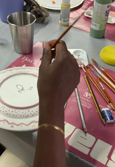 Pottery Painting Experience: Hands and Stories