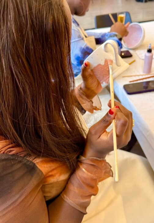 Pottery Painting Experience: Hands and Stories