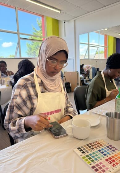 Pottery Painting Experience: Hands and Stories