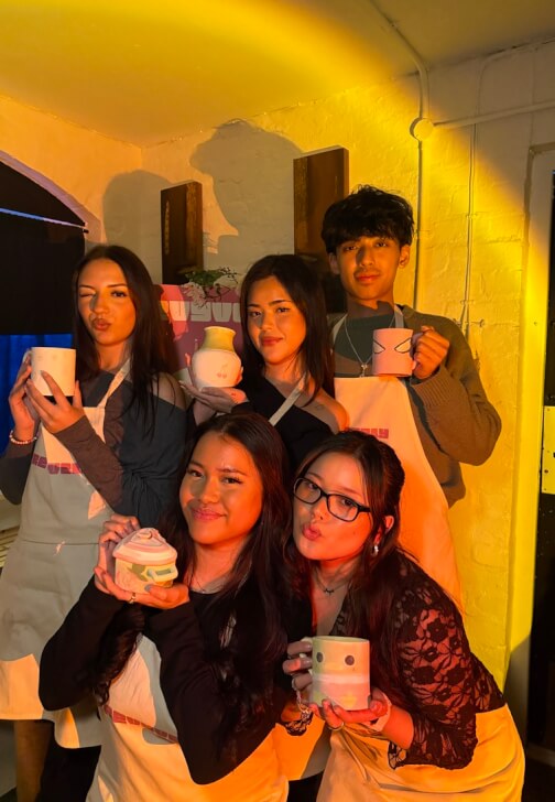 Pottery Painting Experience: Hands and Stories in Candlelight